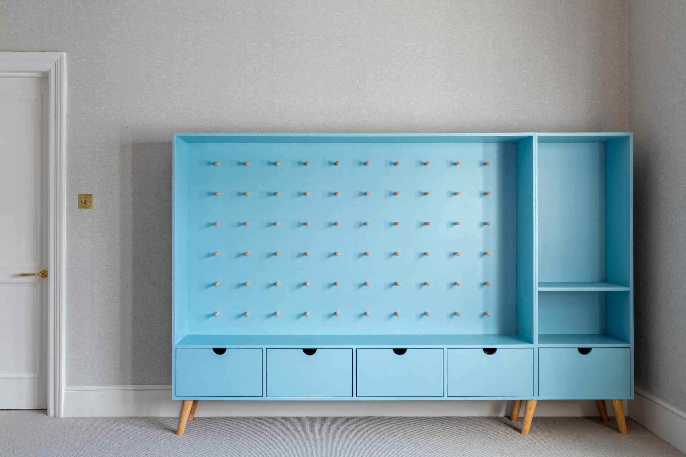 Toy storage ideas, Nurf gun storage, kids toys storage, bespoke kids furniture, modern kids bedroom, blue unit, baby blue unit, free standing furniture, free standing kids furniture, kids interior ideas, playroom furniture ideas, peg board ideas, simple affective toy storage, simple storage solutions, trending storage ideas,